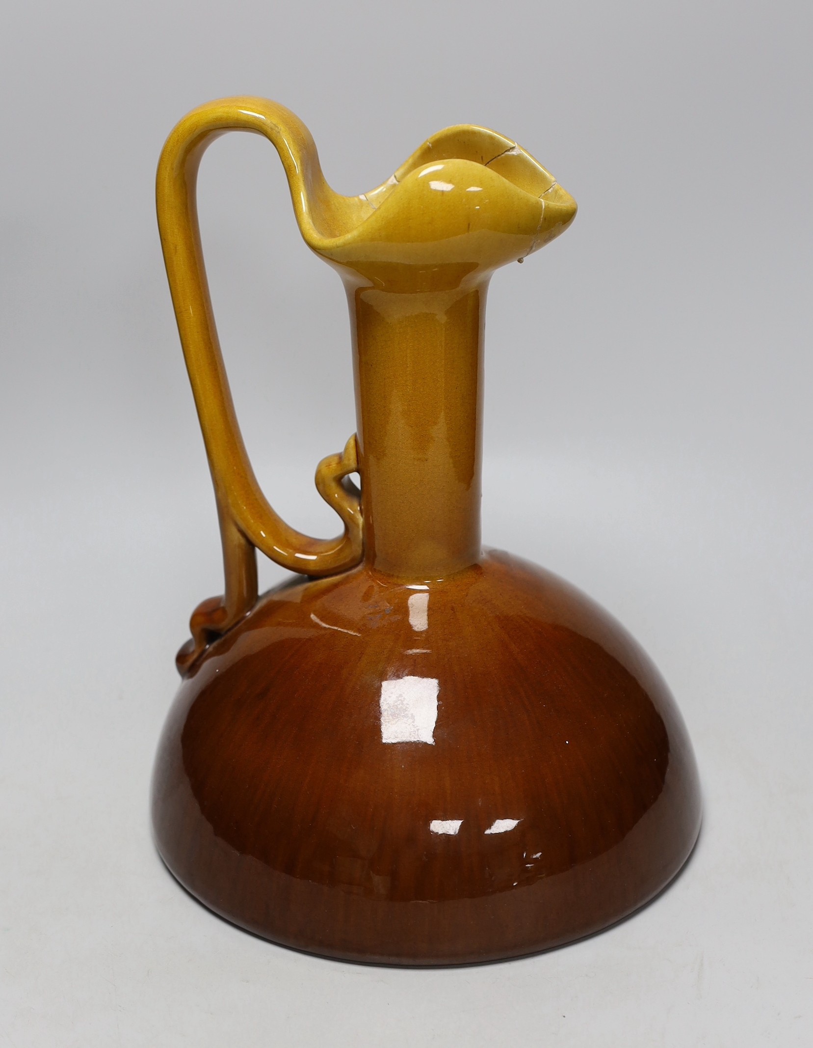 A Bretby ewer in the style of Christopher Dresser, base to top of handle, 31cm high